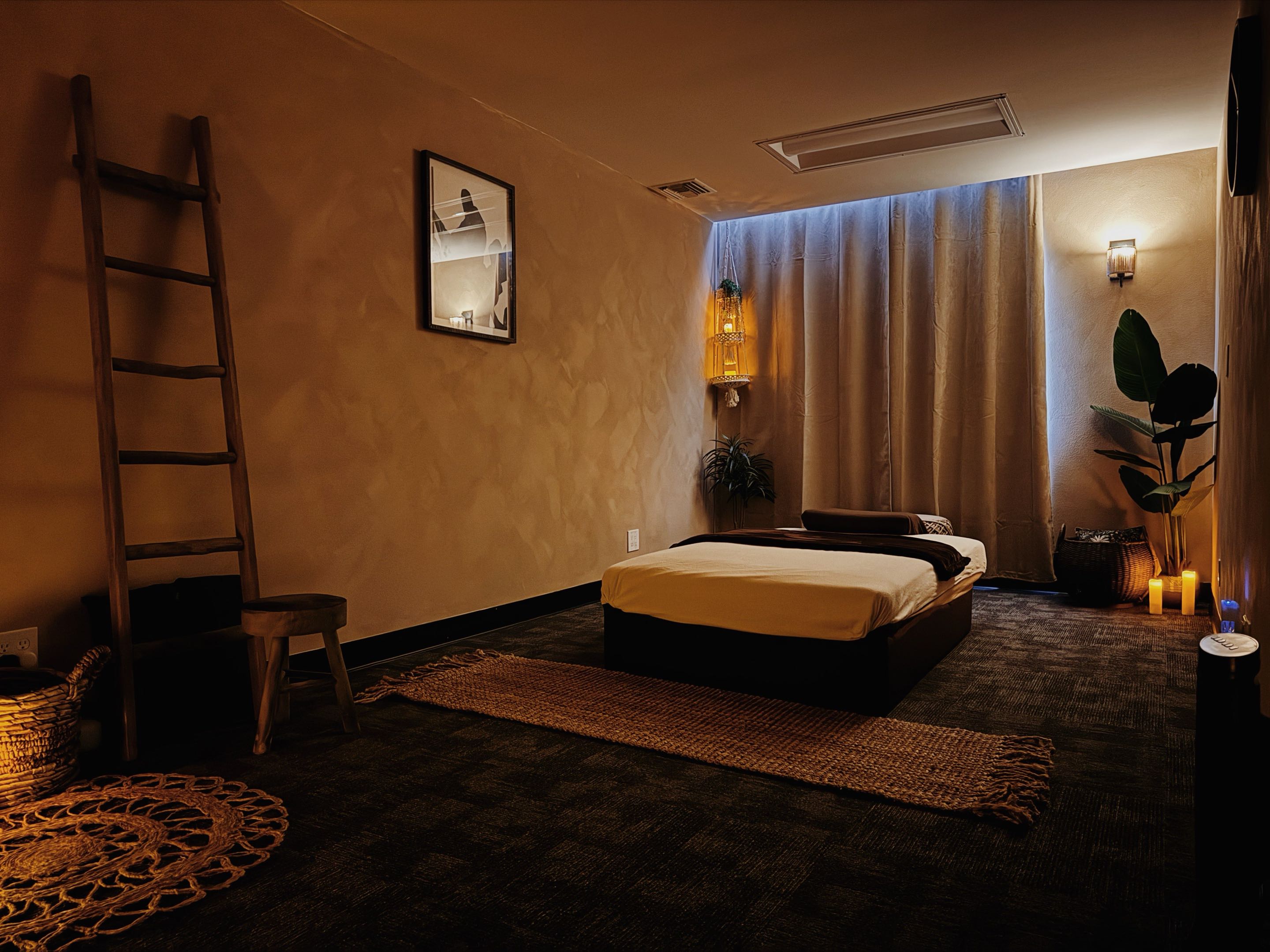 Warm moody treatment room at Emerald Healing Center